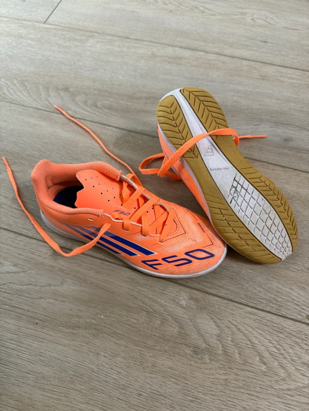 adidas Kids Orange Indoor Soccer Sneakers with Blue Accents